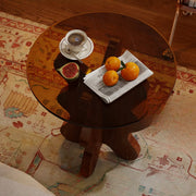 Artistic Round Glass Top Side Table with Sculpted Wood Base