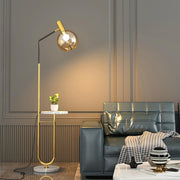 Contemporary Gold Globe Floor Lamp with Marble Storage