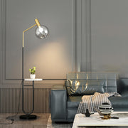 Contemporary Gold Globe Floor Lamp with Marble Storage