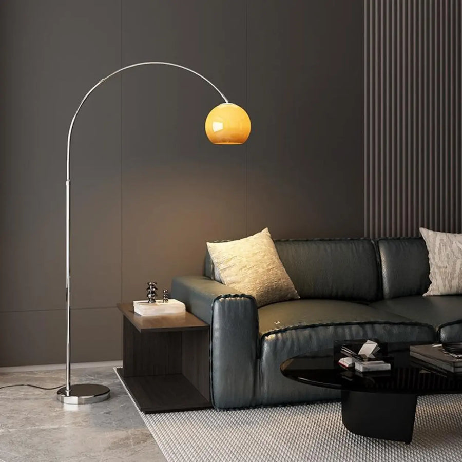 Sleek Adjustable Amber Glass Globe Arched Floor Lamp